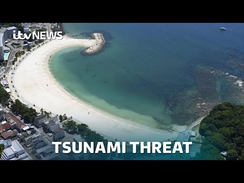 Tsunami warnings downgraded after huge earthquake - but threat not over yet | ITV News