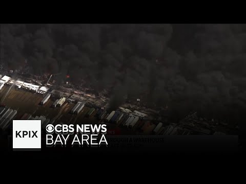Large warehouse fire sending large plumes of smoke throughout Tracy