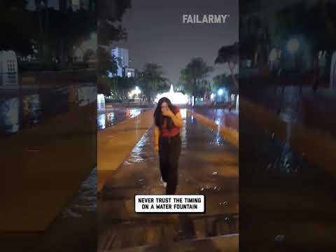Woman Gets Soaked by Water Fountain