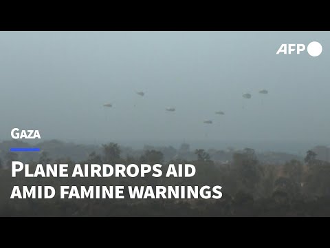 Plane airdrops aid over Gaza amid Israeli operations | AFP