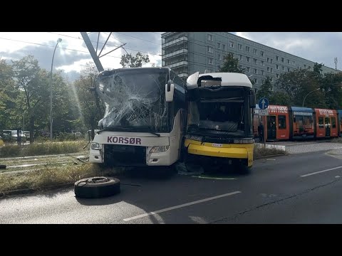 Images of scene of crash between bus and tram in Berlin, injuring seven people | AFP