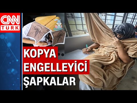 Kopya önleyici şapkayla sınava girdiler