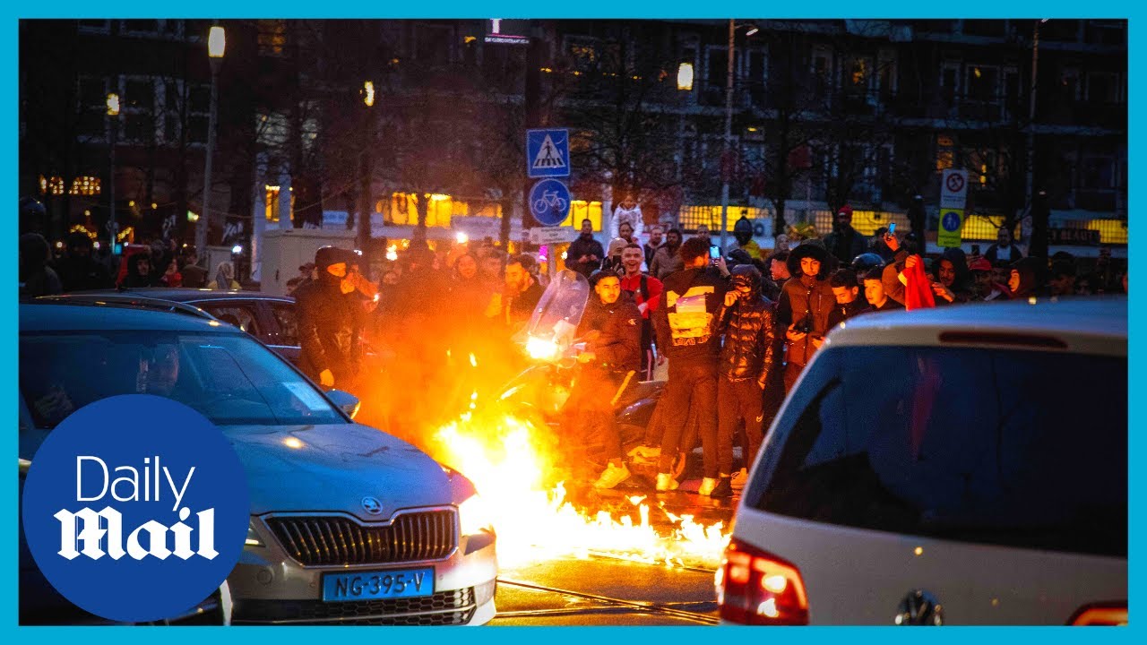 Rioters set car ablaze in Amsterdam after Morocco beats Belgium 2-0 in World Cup