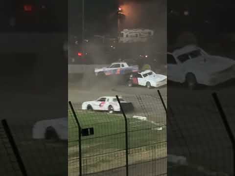 Street stock feature race where cars just spinning out of control from in the corner and keep going - dirt track racing video image