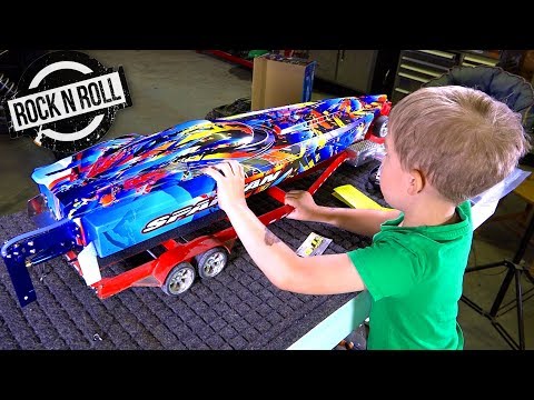 UNBOXiNG a TRAXXAS SPARTAN ROCK n' ROLL V-Hull SPEED BOAT w/ my Son! | RC ADVENTURES - UCxcjVHL-2o3D6Q9esu05a1Q